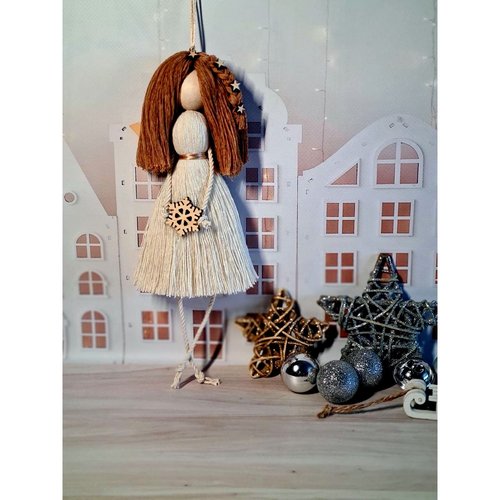 Doll Motanka with brown hair and a snowflake 17404-motanka photo